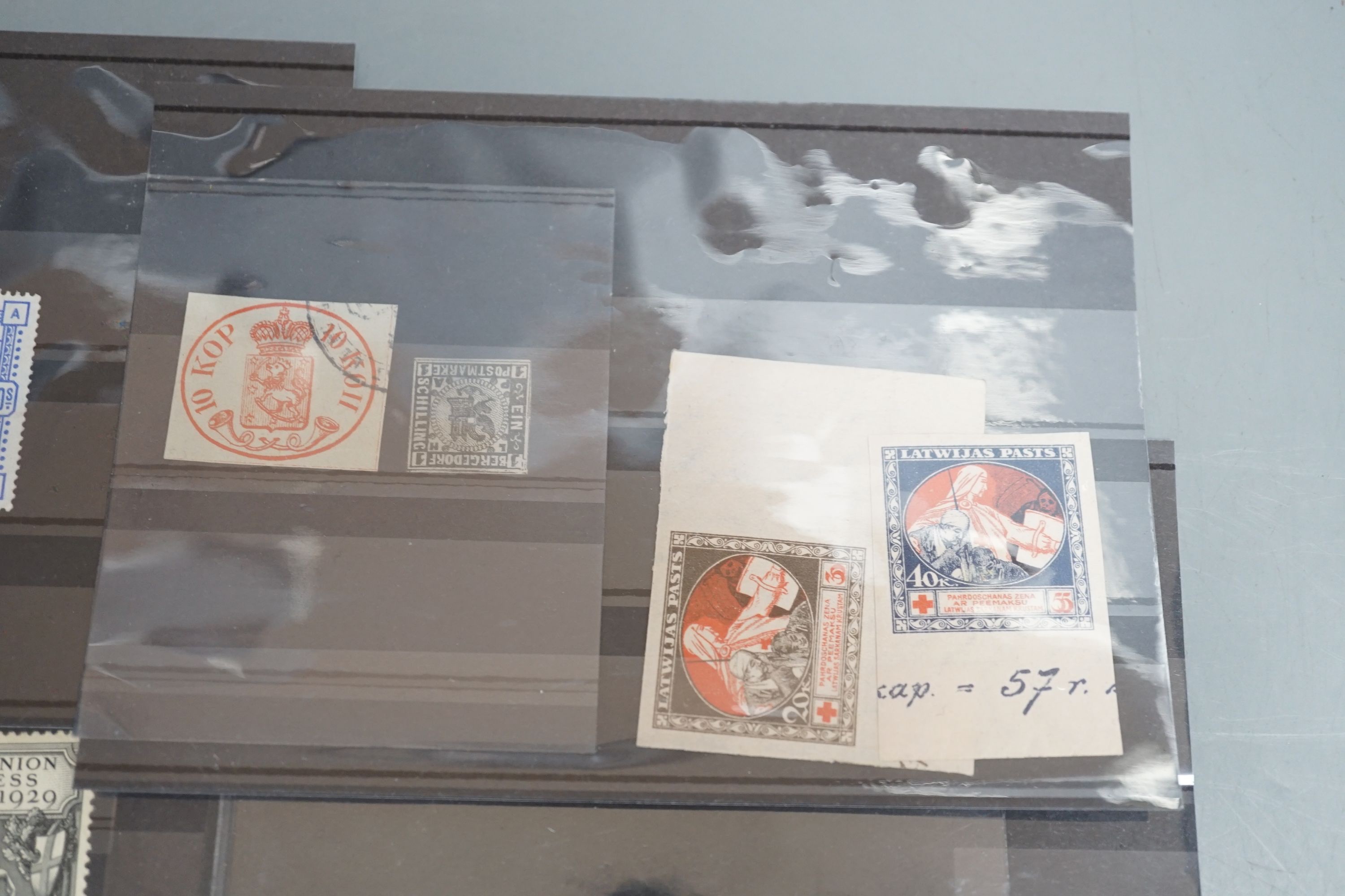 A small group of stamps - GB 1840 1d black used, 1885 2sh.6d. 10sh. used, 1929 Puc £1 mint and £1 used and various